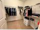 Large walk-in closet with ample shelving at 10059 Crooked Creek Dr # 102, Venice, FL 34293