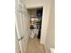 Well-organized linen closet with ample shelving at 10059 Crooked Creek Dr # 102, Venice, FL 34293