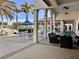 Relaxing outdoor patio area with seating and pool views at 10059 Crooked Creek Dr # 102, Venice, FL 34293