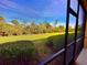 Screened patio overlooking the backyard at 10059 Crooked Creek Dr # 102, Venice, FL 34293