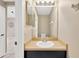 Small half bathroom with a single sink and toilet at 10814 Newbridge Dr, Riverview, FL 33579
