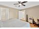 Bright bedroom with a queen-size bed and access to a bathroom at 10814 Newbridge Dr, Riverview, FL 33579