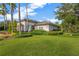 Community clubhouse with landscaping and lawn at 10814 Newbridge Dr, Riverview, FL 33579