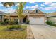 Attractive two-story house with a landscaped yard and two-car garage at 10814 Newbridge Dr, Riverview, FL 33579