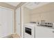 Convenient laundry room with washer and dryer at 10814 Newbridge Dr, Riverview, FL 33579