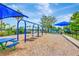 Playground with swings and picnic table at 10814 Newbridge Dr, Riverview, FL 33579