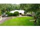 Bird's eye view of home with large yard and driveway at 11554 Monette Rd, Riverview, FL 33569
