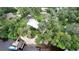 Aerial view of house, expansive lawn, and private dock on the river at 11554 Monette Rd, Riverview, FL 33569