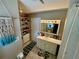 Clean bathroom with white vanity and tiled floor at 11554 Monette Rd, Riverview, FL 33569