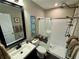 Clean bathroom with a walk-in shower and modern vanity at 11554 Monette Rd, Riverview, FL 33569