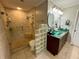 Spa-like bathroom with double vanity and large glass shower at 11554 Monette Rd, Riverview, FL 33569