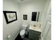 Clean and simple bathroom with toilet and vanity at 11554 Monette Rd, Riverview, FL 33569