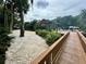 Wooden walkway leads to a covered boat dock with plenty of space for boats at 11554 Monette Rd, Riverview, FL 33569