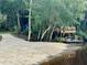 Private boat dock with sandy beach access, ideal for water activities at 11554 Monette Rd, Riverview, FL 33569