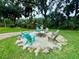 Charming fire pit area with Adirondack chairs, perfect for outdoor gatherings at 11554 Monette Rd, Riverview, FL 33569