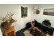 Dedicated home office with a desk, computer, and mounted deer heads at 11554 Monette Rd, Riverview, FL 33569