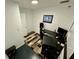 Bright and airy home office with a computer setup and comfortable seating at 11554 Monette Rd, Riverview, FL 33569