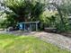 Private backyard hot tub area near a screened-in structure at 11554 Monette Rd, Riverview, FL 33569