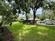 Single story home with a large yard and mature trees at 11554 Monette Rd, Riverview, FL 33569