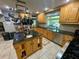 Large kitchen with island, stainless steel appliances, and ample cabinetry at 11554 Monette Rd, Riverview, FL 33569