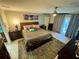 Main bedroom with king-size bed and access to patio at 11554 Monette Rd, Riverview, FL 33569