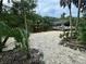 Sandy beach with access to the river and a covered boat dock at 11554 Monette Rd, Riverview, FL 33569