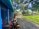 Charming screened porch with access to a lush backyard and patio at 11554 Monette Rd, Riverview, FL 33569