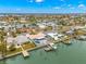 Waterfront property featuring a private dock and boat slip at 12350 4Th E St, Treasure Island, FL 33706