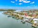 Single-story home with private dock and waterfront access at 12350 4Th E St, Treasure Island, FL 33706