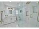 Elegant bathroom with a frameless glass shower and modern vanity at 1448 S Hercules Ave, Clearwater, FL 33764