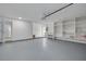 Garage with ample storage shelving and a work bench at 1448 S Hercules Ave, Clearwater, FL 33764