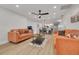Open concept living room with a view into the dining area and kitchen at 1448 S Hercules Ave, Clearwater, FL 33764