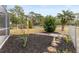 Landscaped backyard with bird bath and walkway at 14912 Brookridge Blvd, Brooksville, FL 34613