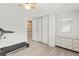 Bedroom with dresser, large closet, and hardwood floors at 14912 Brookridge Blvd, Brooksville, FL 34613