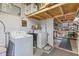 Laundry room with washer, dryer, and workbench at 14912 Brookridge Blvd, Brooksville, FL 34613