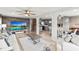 Open living room and kitchen with wood-look floors and modern decor at 14912 Brookridge Blvd, Brooksville, FL 34613