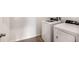 Bright laundry room with washer and dryer included at 16748 Trite Bend St, Wimauma, FL 33598