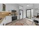 Modern kitchen with stainless steel appliances at 1725 Pine Ridge E Way # E, Palm Harbor, FL 34684