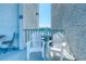 Enjoy the view from this waterfront balcony with two chairs at 175 Medallion Blvd # F, Madeira Beach, FL 33708