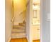 Convenient half bathroom with stacked washer and dryer at 175 Medallion Blvd # F, Madeira Beach, FL 33708
