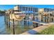 Boat slip with lift in a waterfront community at 175 Medallion Blvd # F, Madeira Beach, FL 33708
