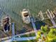 Aerial view of multiple private boat slips at 175 Medallion Blvd # F, Madeira Beach, FL 33708