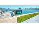 Community boardwalk with a dock offering water access at 175 Medallion Blvd # F, Madeira Beach, FL 33708