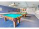 Well-lit game room with two billiard tables at 175 Medallion Blvd # F, Madeira Beach, FL 33708