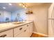 Kitchen features granite countertops and double sink at 175 Medallion Blvd # F, Madeira Beach, FL 33708
