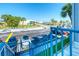 View of community parking lot from a building stairwell at 175 Medallion Blvd # F, Madeira Beach, FL 33708