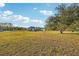 Large backyard with home view at 18520 Oak Way Dr, Hudson, FL 34667