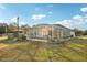 Spacious backyard with screened pool at 18520 Oak Way Dr, Hudson, FL 34667