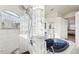 Modern bathroom with a large walk-in shower and soaking tub at 18520 Oak Way Dr, Hudson, FL 34667