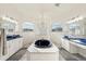 Large bathroom with a luxurious soaking tub and double vanity at 18520 Oak Way Dr, Hudson, FL 34667